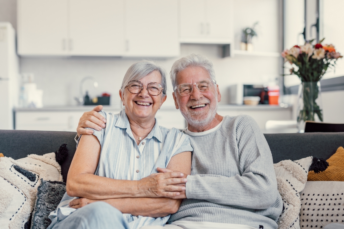 an elderly couple sit on their couch in Middletown, Ohio waiting for boiler maintenance services
