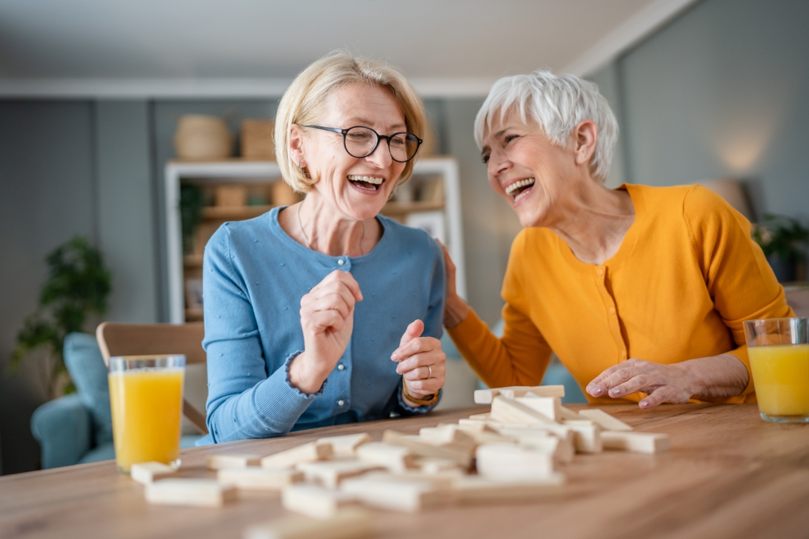 Two woman smiling while waiting for HVAC Services in Trenton, OH